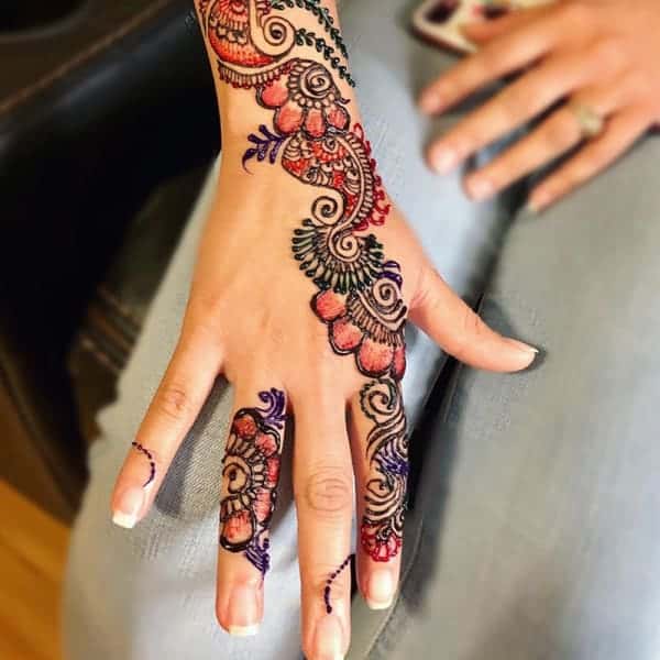 Applying henna tattoo on a bride hands Brown Colors of Henna Ink Indian  Traitional Mehendi Ceremony Stock Photo  Adobe Stock
